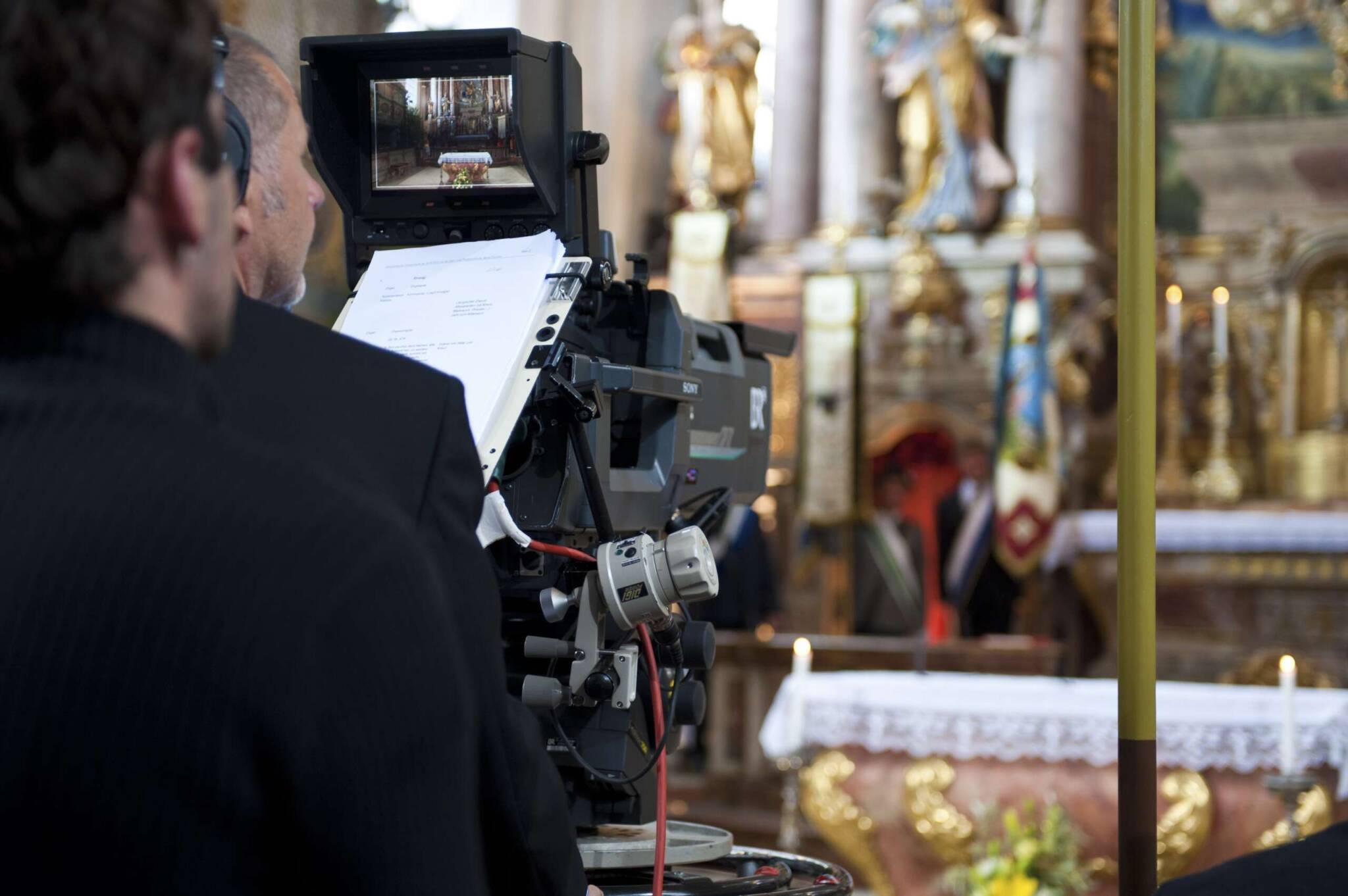 Filmteam Filming In Church.